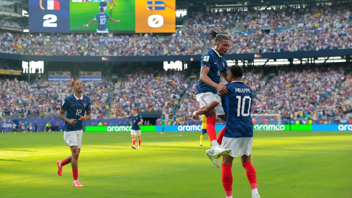 FIFA Rejects France's Appeal, Upholds Yellow Card Against French Star Ahead Of World Cup Quarterfinal Michael Olise celebrates a goal with Kylian Mbappe
