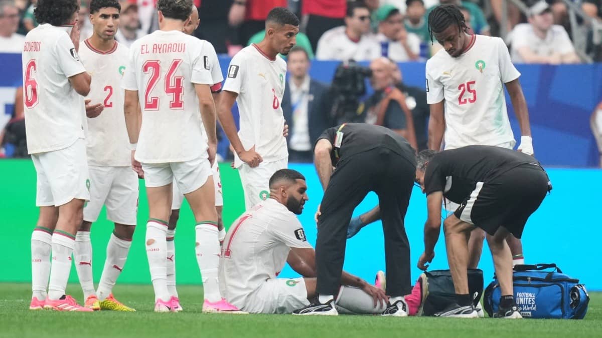 Morocco's Ismael Saibari receives medical attention during Canada clash
