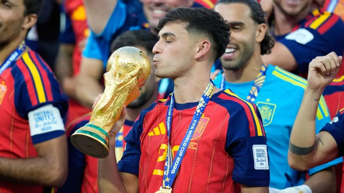 'It Was Written': Pedri's '190726' Prophecy Comes True As Spain Lift 2nd World Cup Title On July 19 Pedri kisses FIFA World Cup trophy after Spain's win over Argentina in the final