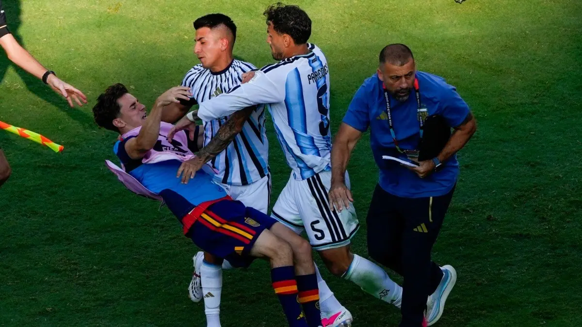 FIFA Set To Probe Argentina's Post-World Cup 2026 Final Brawl, Likely To Initiate Stringent Action Against Lionel Messi & Co. - Report Spain's Gavi falls as he scuffles with Argentina's Leandro Paredes and Thiago Almada after the end of FIFA World Cup 2026 final