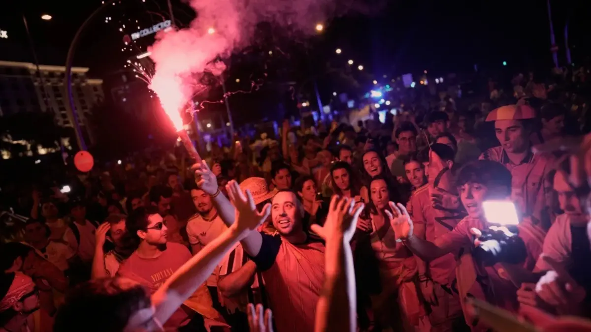 Spain's World Cup-Winning Team Head Home For Royal Welcome After Win Over Argentina In New York Spanish fans celebrate in central Madrid after Spain defeated Argentina in the FIFA World Cup 2026 final