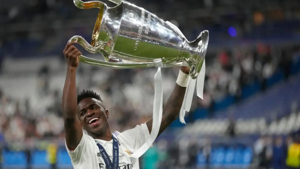 Vinicius Junior Plays Down Arsenal Talks, Extends Contract With Real Madrid Till 2032 Vinicius Junior celebrating after winning UCL with Real Madrid