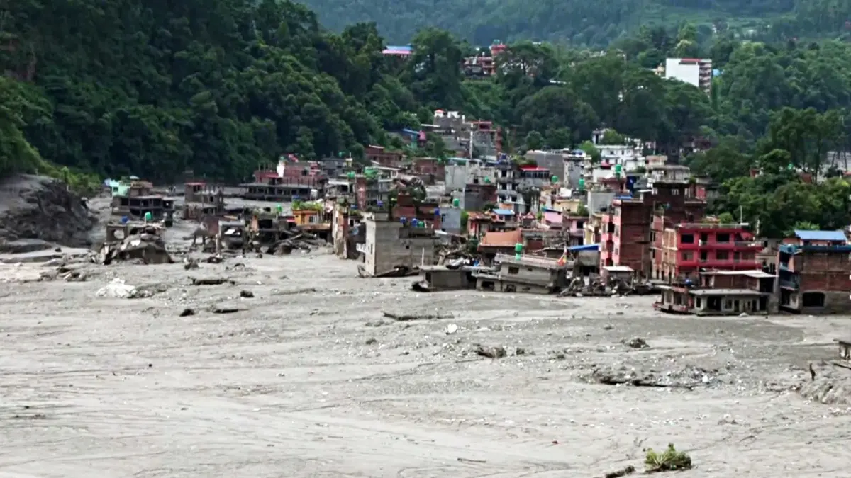 UEFA To Pay Tribute To Nepal Flood Victims Ahead Of Champions League Games A drone view of the buildings damaged and surrounded by thick mud and debris along the Trishuli River following flash floods