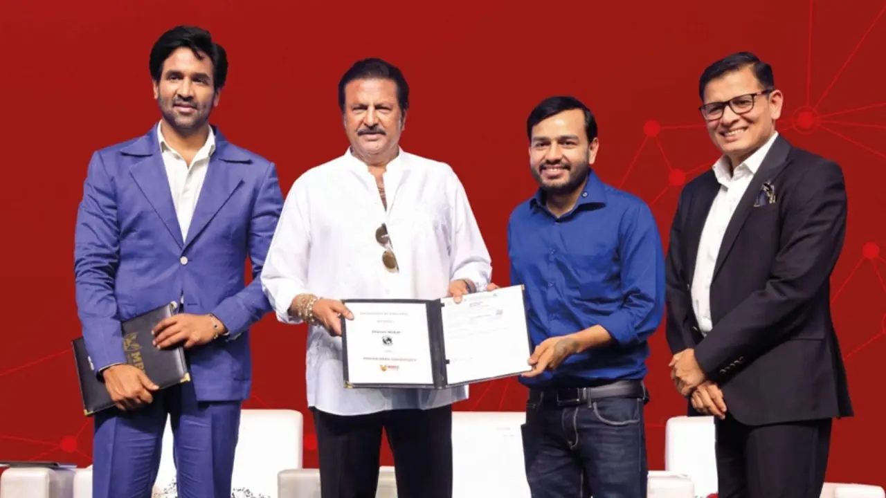 मोहन बाबू यूनिवर्सिटी और फिजिक्सवाला ने उद्योग-उन्मुख शिक्षा को मजबूत करने के लिए मिलाया हाथ मोहन बाबू विश्वविद्यालय (MBU) के चांसलर डॉ. एम. मोहन बाबू एवं फिजिक्स वाला के संस्थापक व मुख्य कार्यकारी अधिकारी (CEO) अलख पांडे तिरुपति में समझौता ज्ञापन (MoU) के दस्तावेजों का आदान-प्रदान करते हुए।