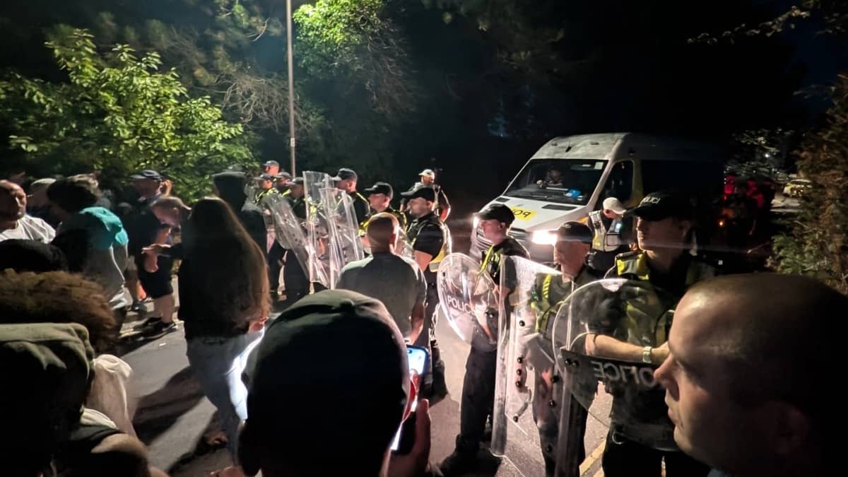 Police forms a line to block protesters in Portsmouth