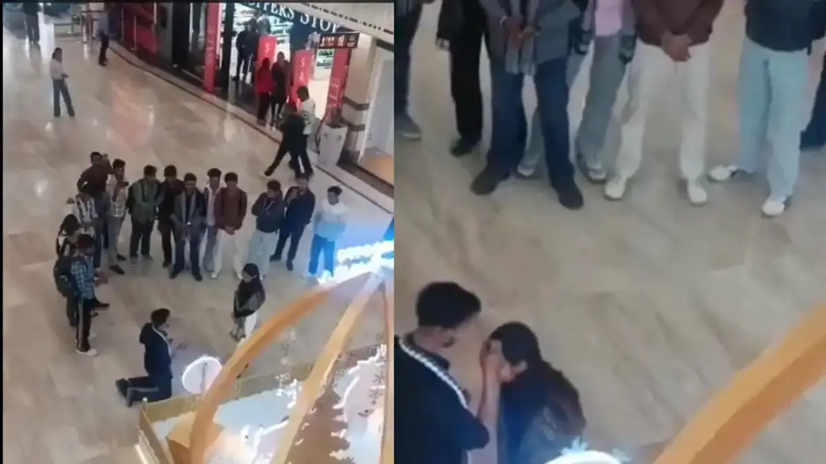A couple proposing at Gaur Central Mall in Ghaziabad with the boyfriend applying Sindoor and gifting a Mangalsutra
