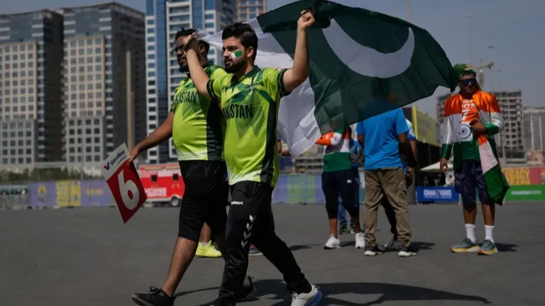 A fan heads towards the Dubai International Stadium during the IND vs PAK game