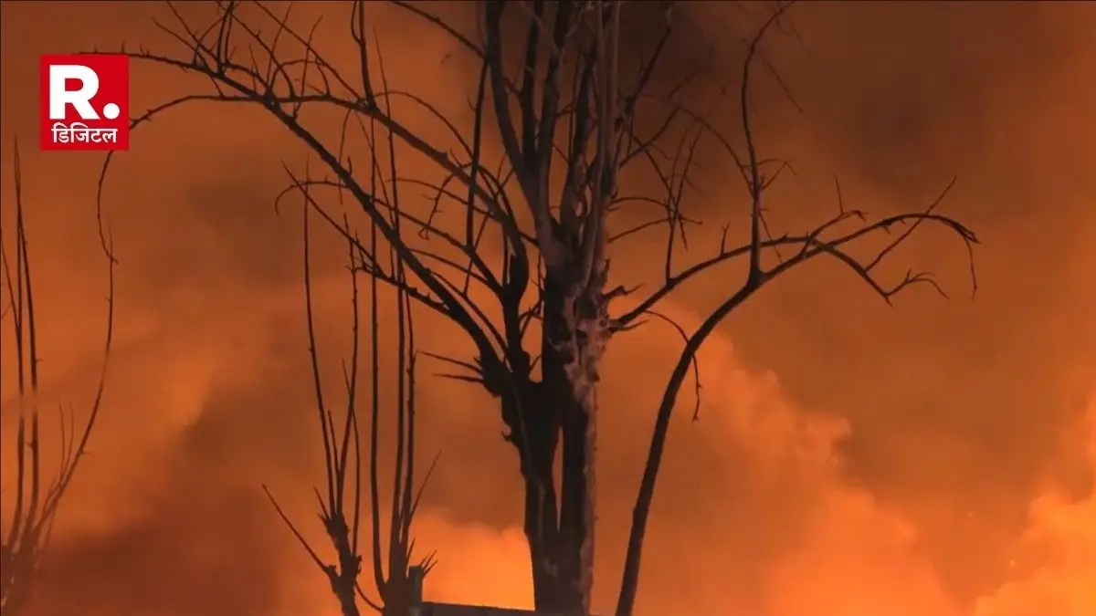 A massive fire broke out in a slum near Rithala Metro station, gutting 500 huts.