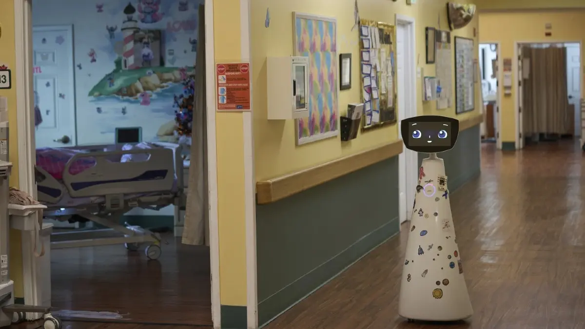 A Robot Programmed to Act Like a 7-Year-Old Girl Works to Combat Fear and Loneliness in Hospitals A robot programmed to act like a 7-year-old girl works to combat fear and loneliness in hospitals