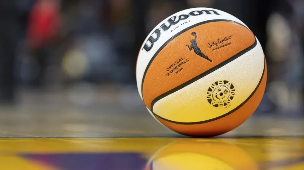 A WNBA basketball sits on the court during a WNBA game