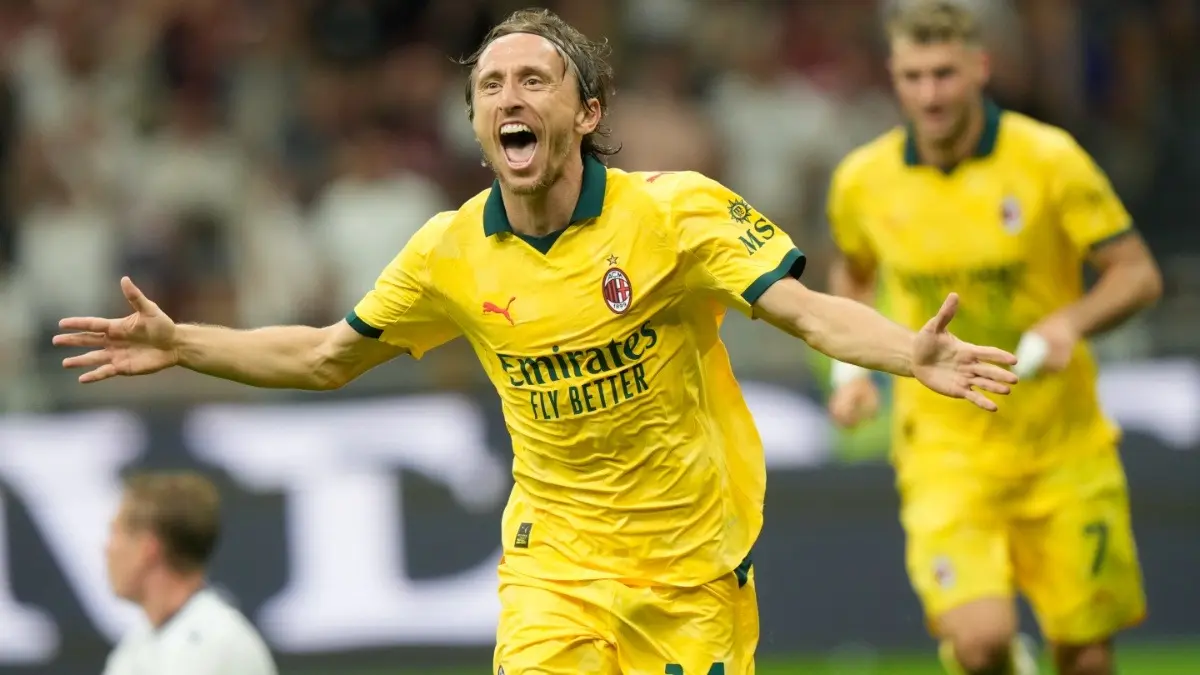 AC Milan's Luka Modric celebrates after scoring the winning goal against Bologna