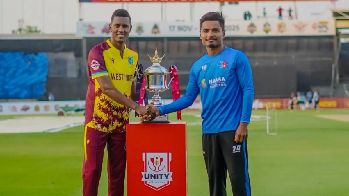 WI vs NEP Live Streaming Details: Here's When And Where To Watch West Indies Clash With Nepal In Second T20I Of The Series Akeal Hosein and Rohit Paudel pose for a photograph