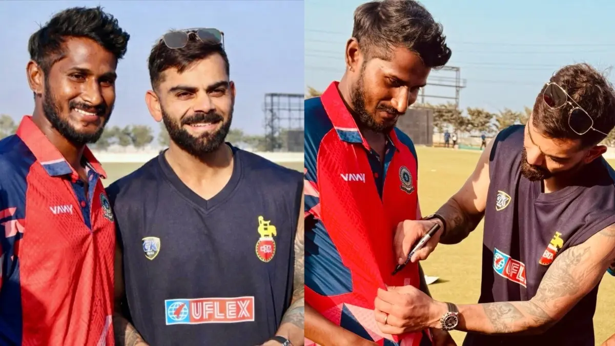Andhra all-rounder Bodhala Vinay Kumar meets Virat Kohli during VHT fixture