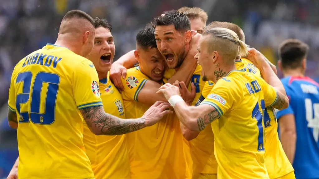 Ukraine back on track after defeating Slovakia 2-1 for a comeback win at Euro 2024 Ukraine celebrates winning goal vs Slovakia at Euro 2024