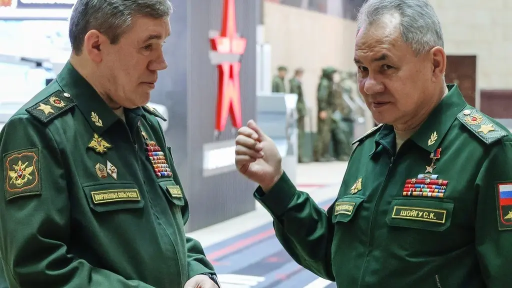 Sergei Shoigu, right, gestures as he speaks to Russian Chief of General Staff Gen. Valery Gerasimov