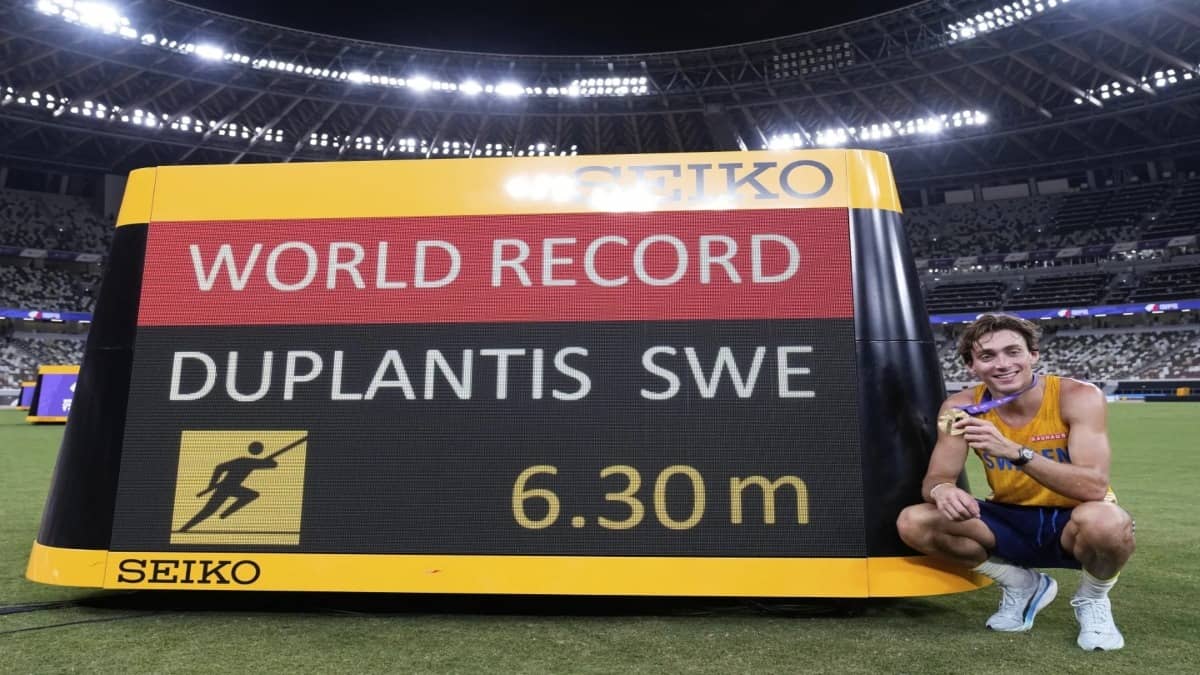 Armand Duplantis poses after breaking his won world record