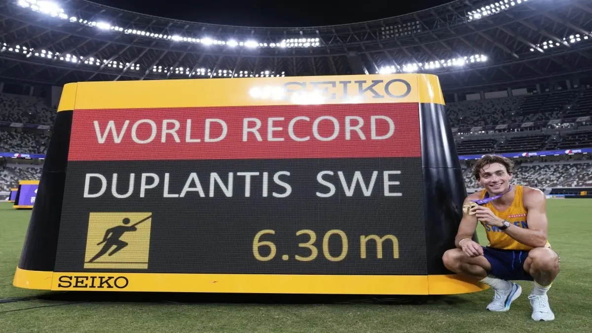 Armand Duplantis poses after breaking his won world record