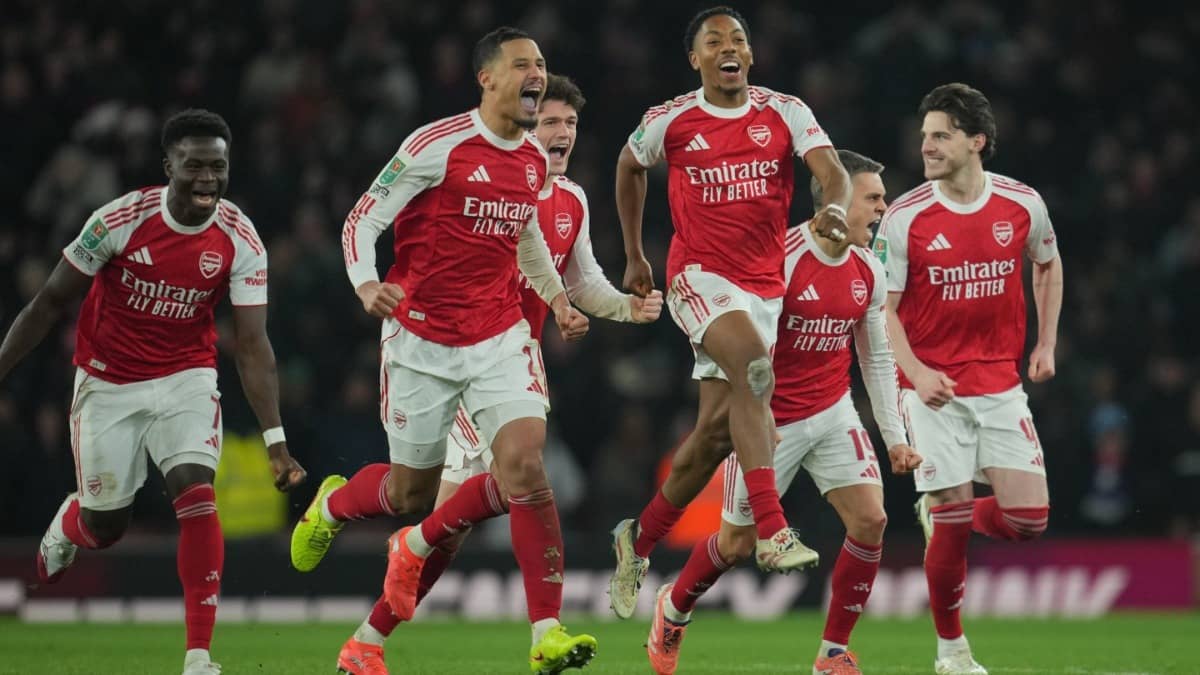 Arsenal players celebrate after winning in a penalty shootout in the League Cup quarter-final fixture against Crystal Palace
