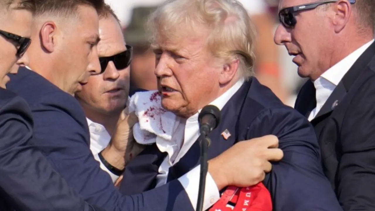 Gunshot, Ear Grab, Bleed: Moment In Video Captures Trump Going Down On Stage Assassination Attempt on Trump