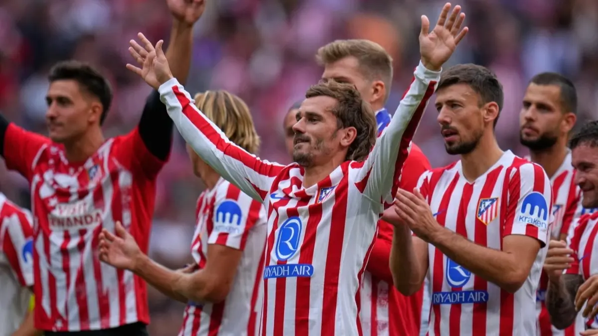 Atletico Madrid players celebrate a win