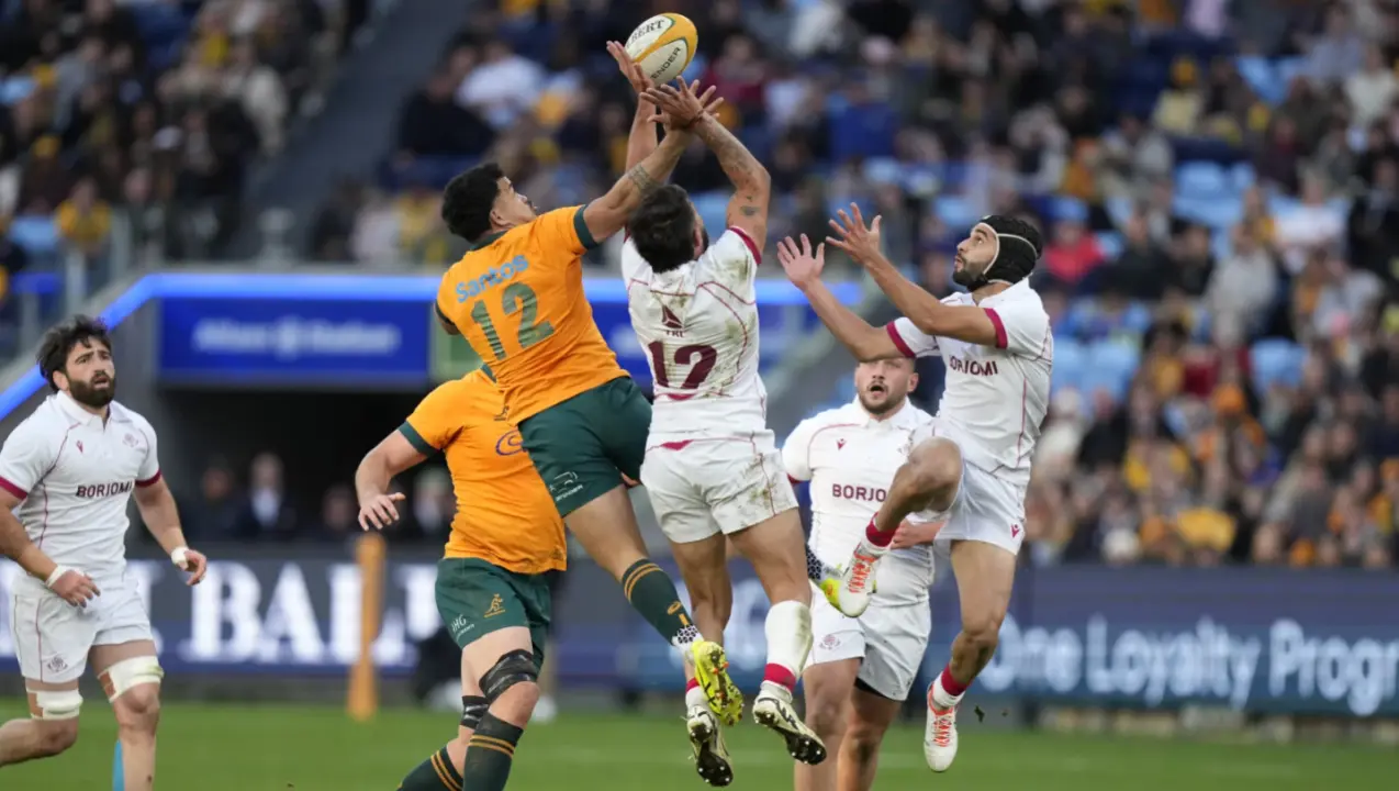 Wallabies score four 1st-half tries to beat Georgia 40-29 and stay perfect on the season Australia