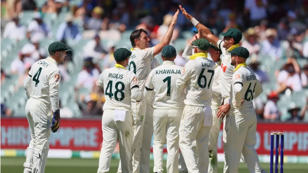 Australia's Pat Cummins celebrates the wicket of England's Jamie Smith with his teammates during the third Test match of the Ashes 2025