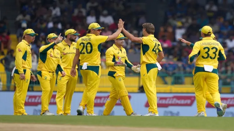 Australian players celebrate a wicket