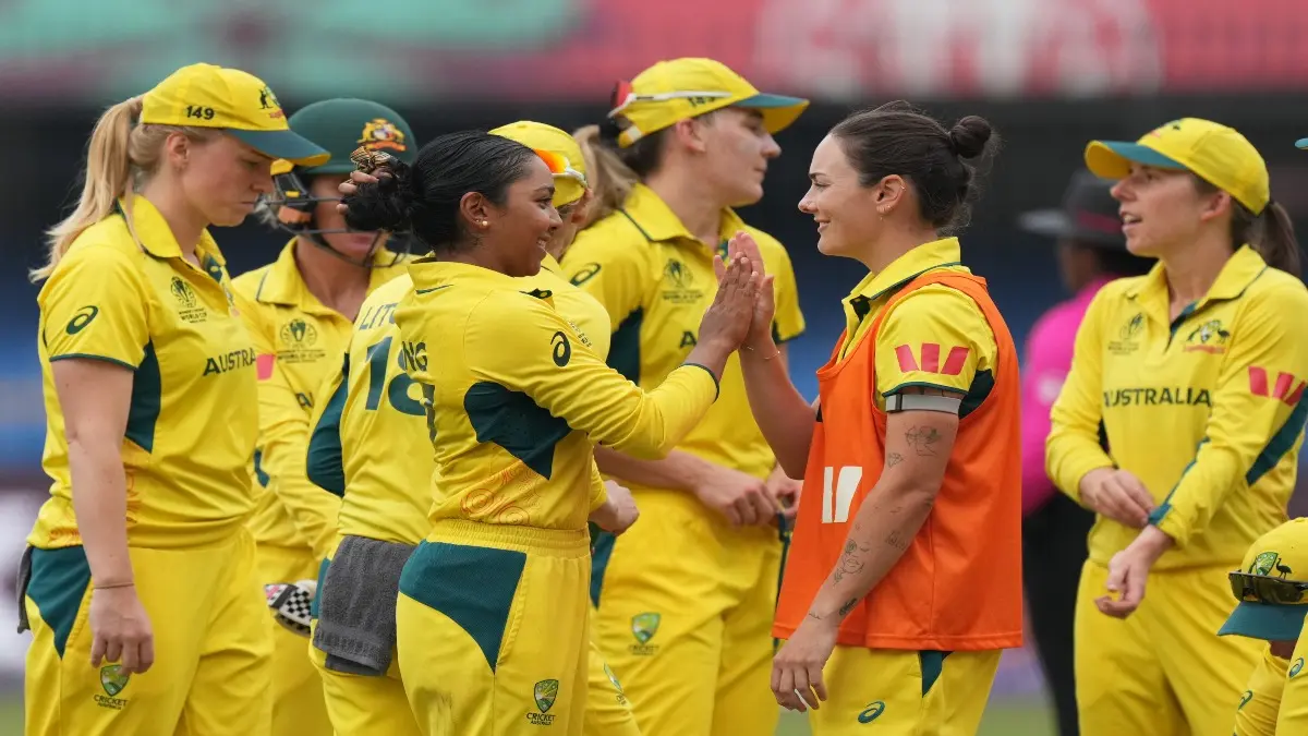 Australian players celebrate a wicket