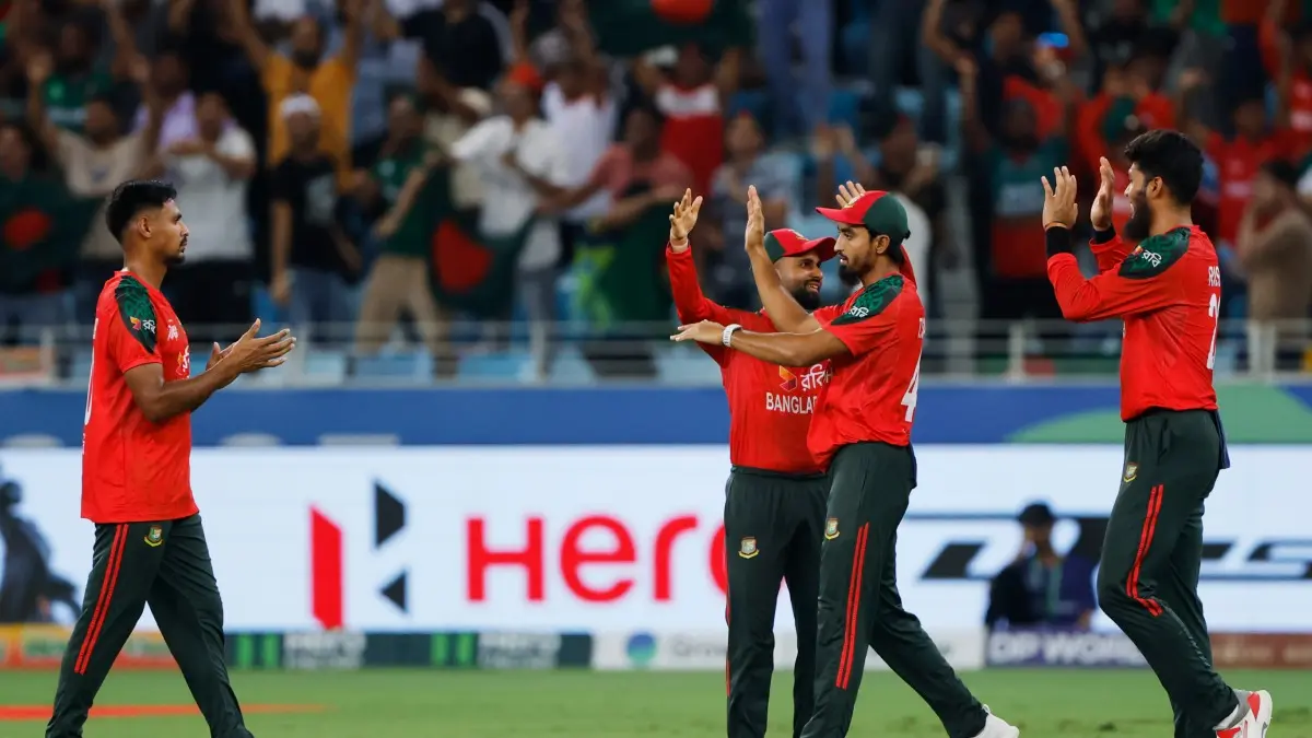 Bangladesh players celebrate a wicket