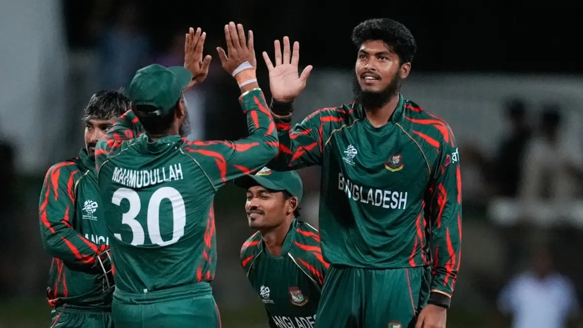 Bangladesh players celebrate a wicket