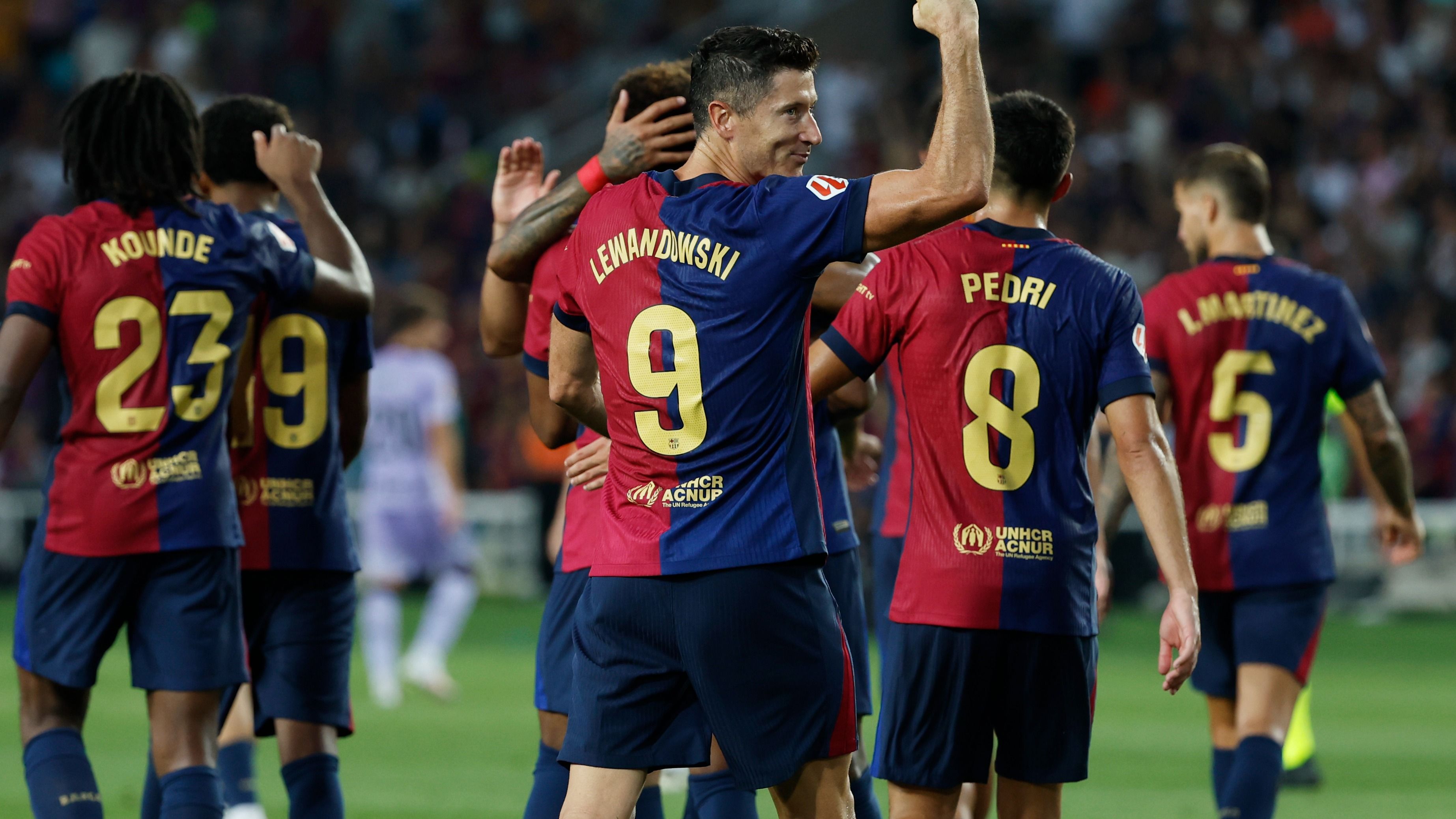 Barcelona players celebrate Robert Lewandowski's goal vs Athletic Club in La Liga