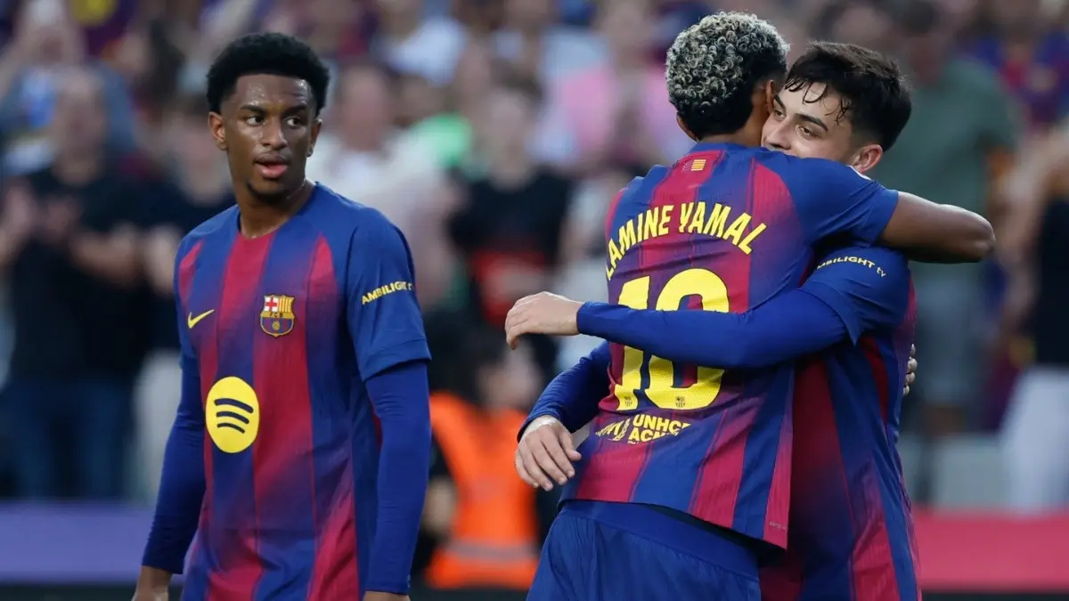 Barcelona's Alejandro Balde, Lamine Yamal, and Pedri during a La Liga match against Girona