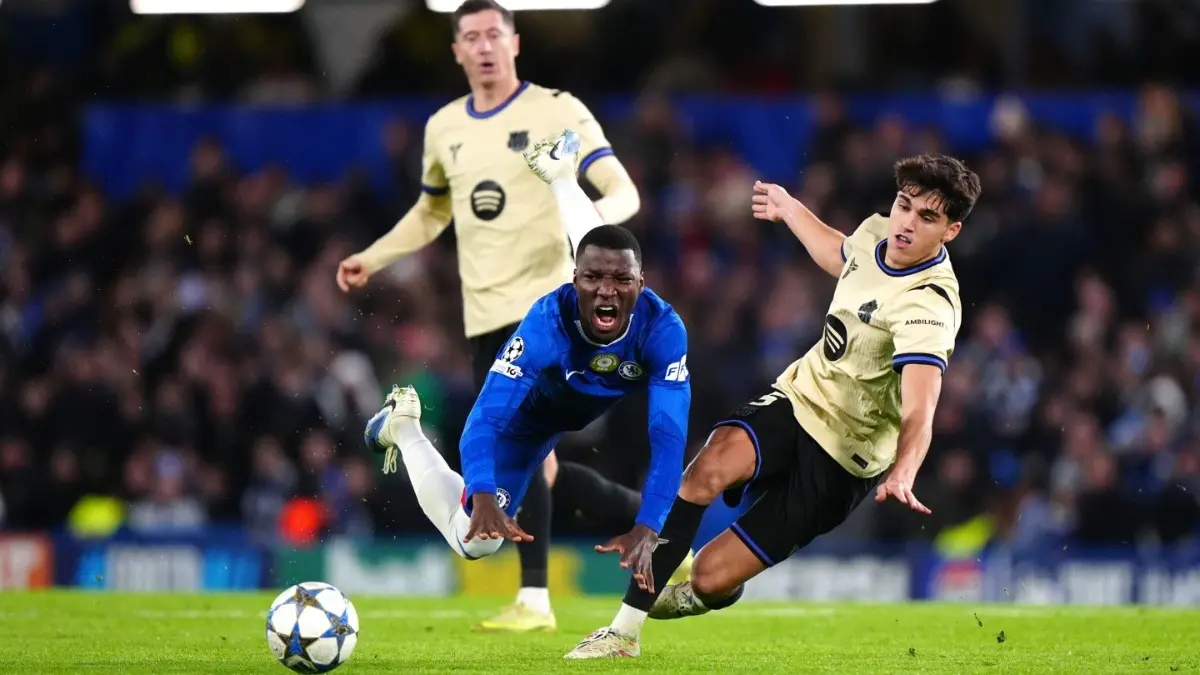 Barcelona's Robert Lewandowski and Pau Cubarsi in action against Chelsea in UCL