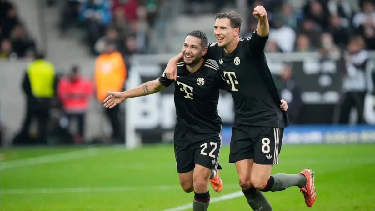 Bayern Munich's Raphaël Guerreiro and Leon Goretzka