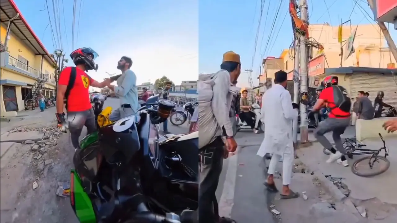 Viral Video: Bike Rider and Scooty Rider Clash in the Middle of the Street Over Minor Issue Bike and Scooty Rider Clash Viral Video