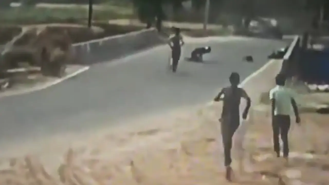 Biker Survives High-Speed Collision With Car In UP's Amroha