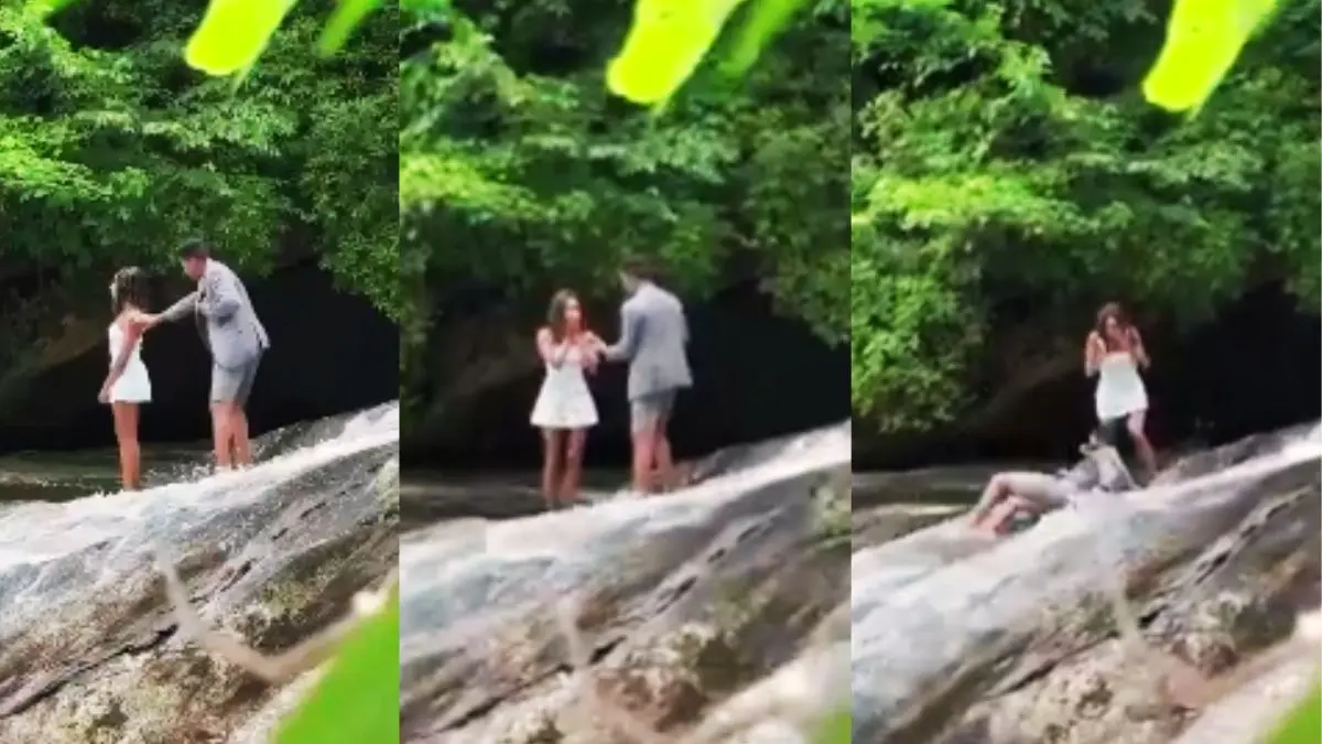 boy proposing girlfriend at edge of waterfall suddenly slipped