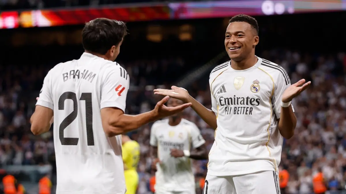 Brahim Diaz and Kylian Mbappe celebrating after scoring a goal