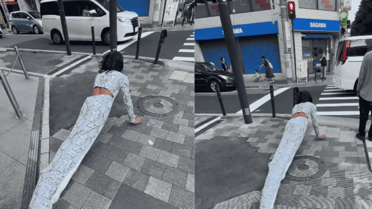 Watch: Brazilian Influencer Turns Snake, Crawls Through Japan Streets Brazilian Influencer Slithers Through Japan Dressed as Snake