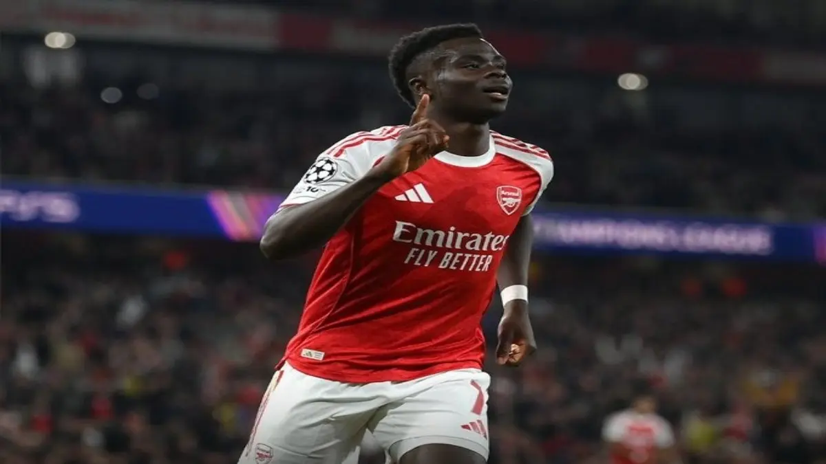 Bukayo Saka celebrating after scoring a goal