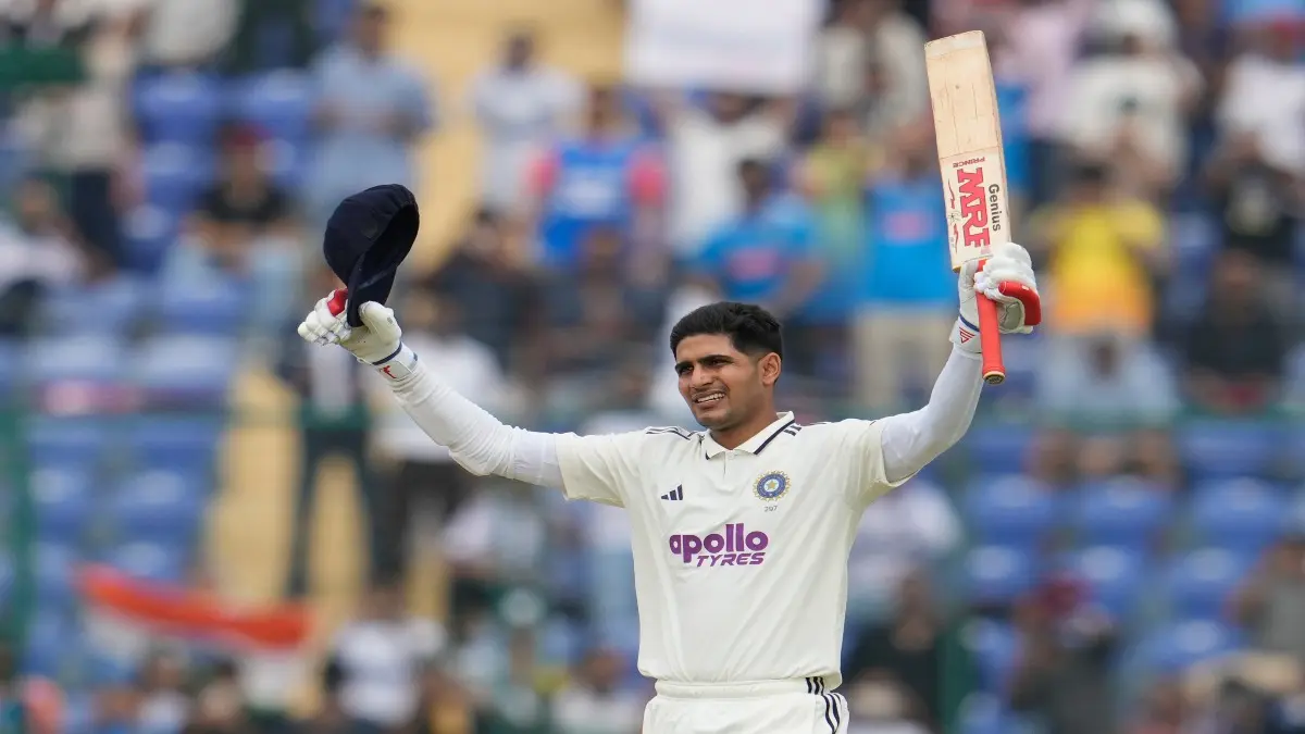 Captain Shubman Gill celebrates after scoring a century