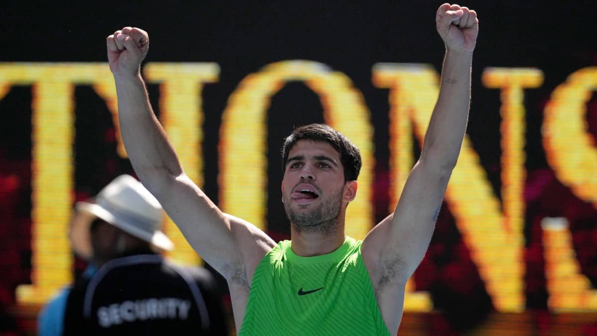 Carlos Alcaraz celebrates his Australian Open win