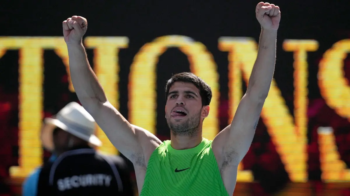 Carlos Alcaraz celebrates his Australian Open win