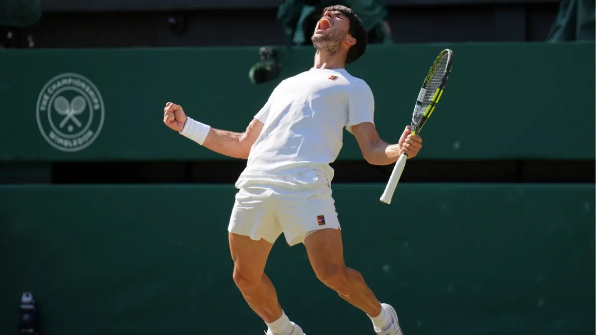 Carlos Alcaraz roars after win over Taylor Fritz in the first semi-final match of the Wimbledon 2025