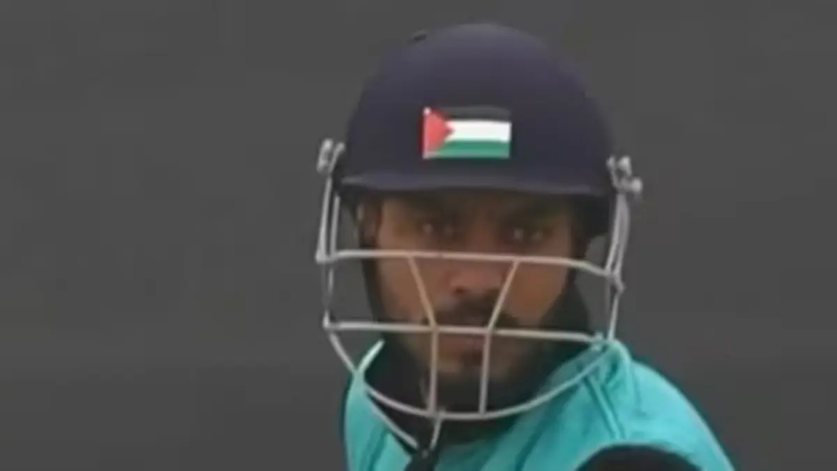 Cricketer's helmet bore the Palestine flag in front