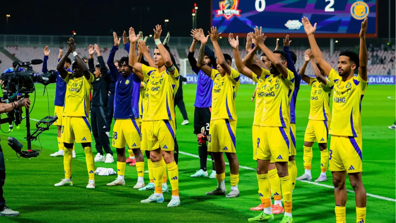 Cristiano Ronaldo and other members of Al-Nassr celebrate their win against Al-Wehda