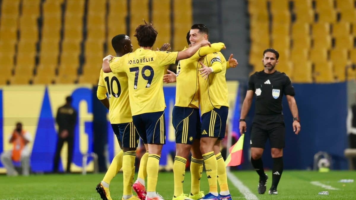 Cristiano Ronaldo celebrating with Al Nassr teammates