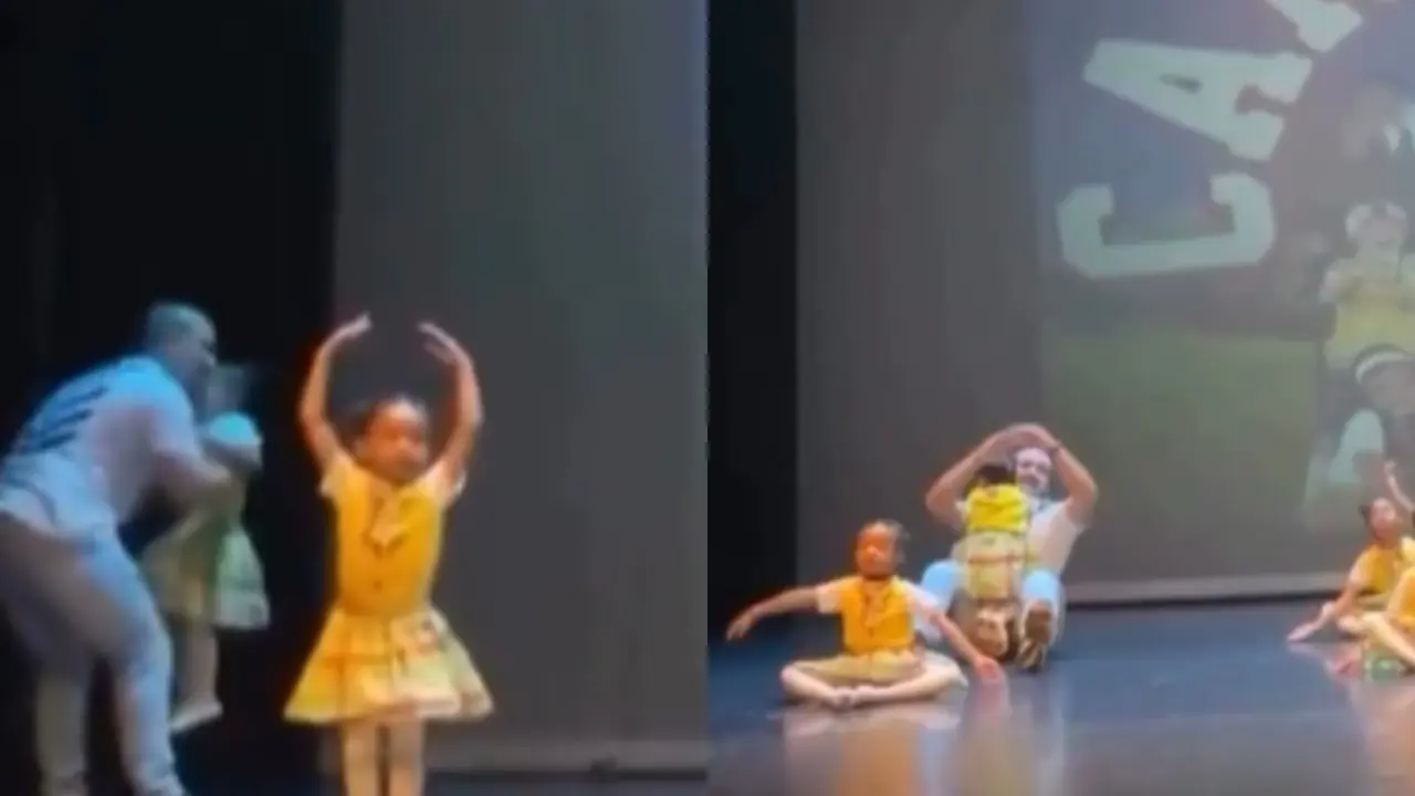 Dad jumps on stage to help crying daughter finish dance performance.