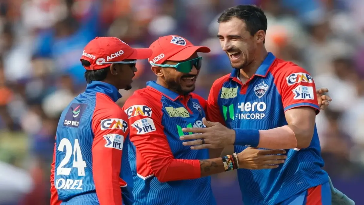 Delhi Capitals players celebrate a wicket