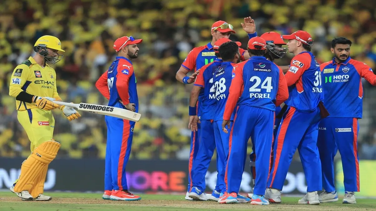 Delhi Capitals players celebrate a wicket